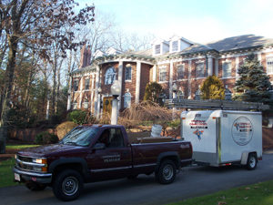 Sweepnman Service Truck in Front of House