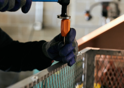 Technician building chimney cap