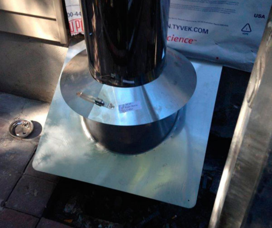 Chimney part being prepped before installation