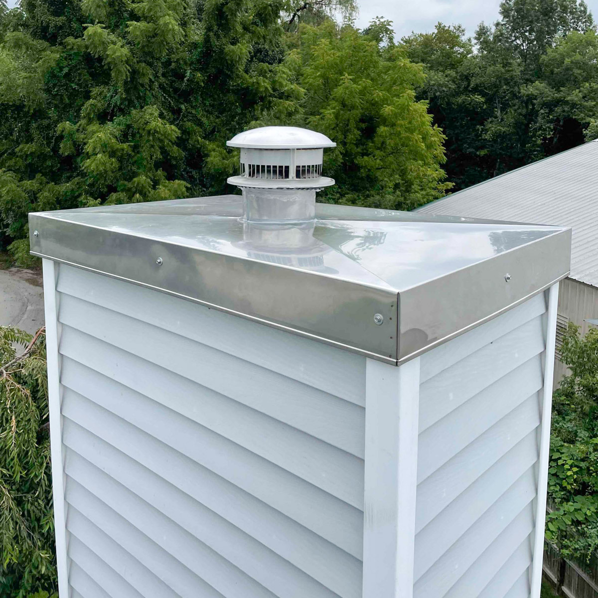 Protecting chimneys with a chimney chase cover in Lowell & Andover, MA