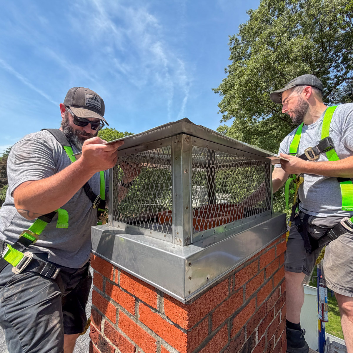 Installing new full-width chimney caps in New Boston, NH